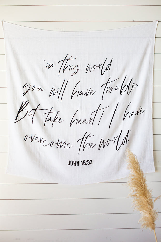
                  
                    Load image into Gallery viewer, Swaddle Blanket + Wall Art - John 16:33 “I have told you these things, so that in me you may have peace. In this world you will have trouble. But take heart! I have overcome the world.”
                  
                