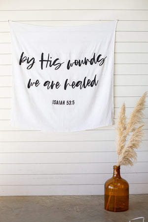 
                  
                    Load image into Gallery viewer, Swaddle Blanket + Wall Art - Isaiah 53:5 But he was pierced for our transgressions, he was crushed for our iniquities; the punishment that brought us peace was on him, and by his wounds we are healed.
                  
                