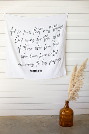 
                  
                    Load image into Gallery viewer, Swaddle  Blanket + Wall art - Romans 8:28: And we know that in all things God works for the good of those who love him, who have been called according to his purpose.
                  
                