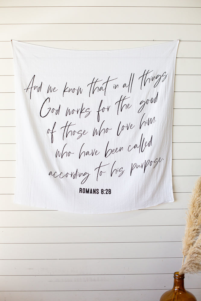 
                  
                    Load image into Gallery viewer, Swaddle  Blanket + Wall art - Romans 8:28: And we know that in all things God works for the good of those who love him, who have been called according to his purpose.
                  
                