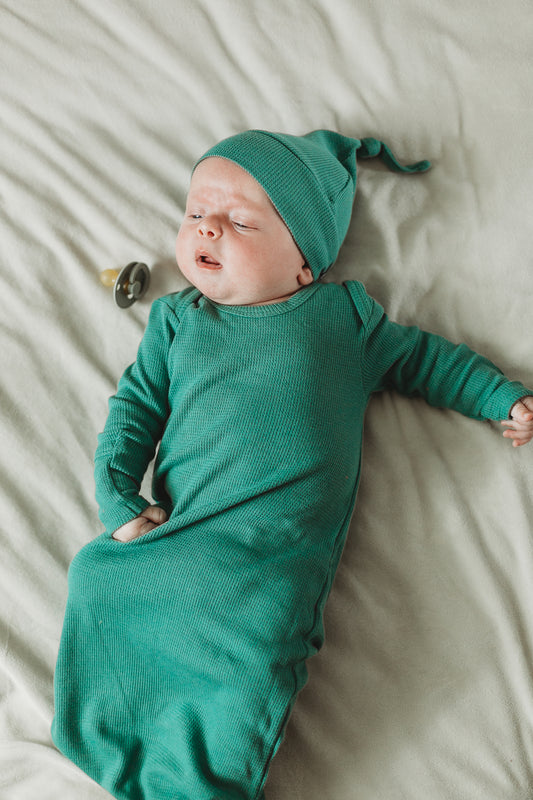 Solid color organic knot hat and gown set by Modern Burlap