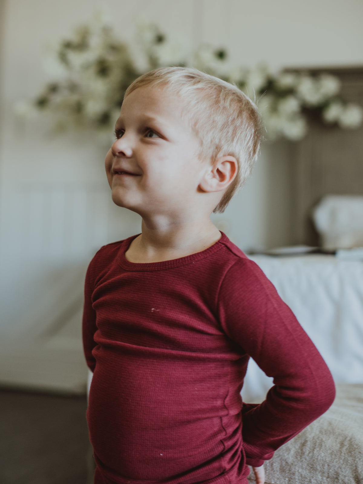 Organic Thermal Baby + Kids Pajama Set | Maroon — Side view of the thermal top