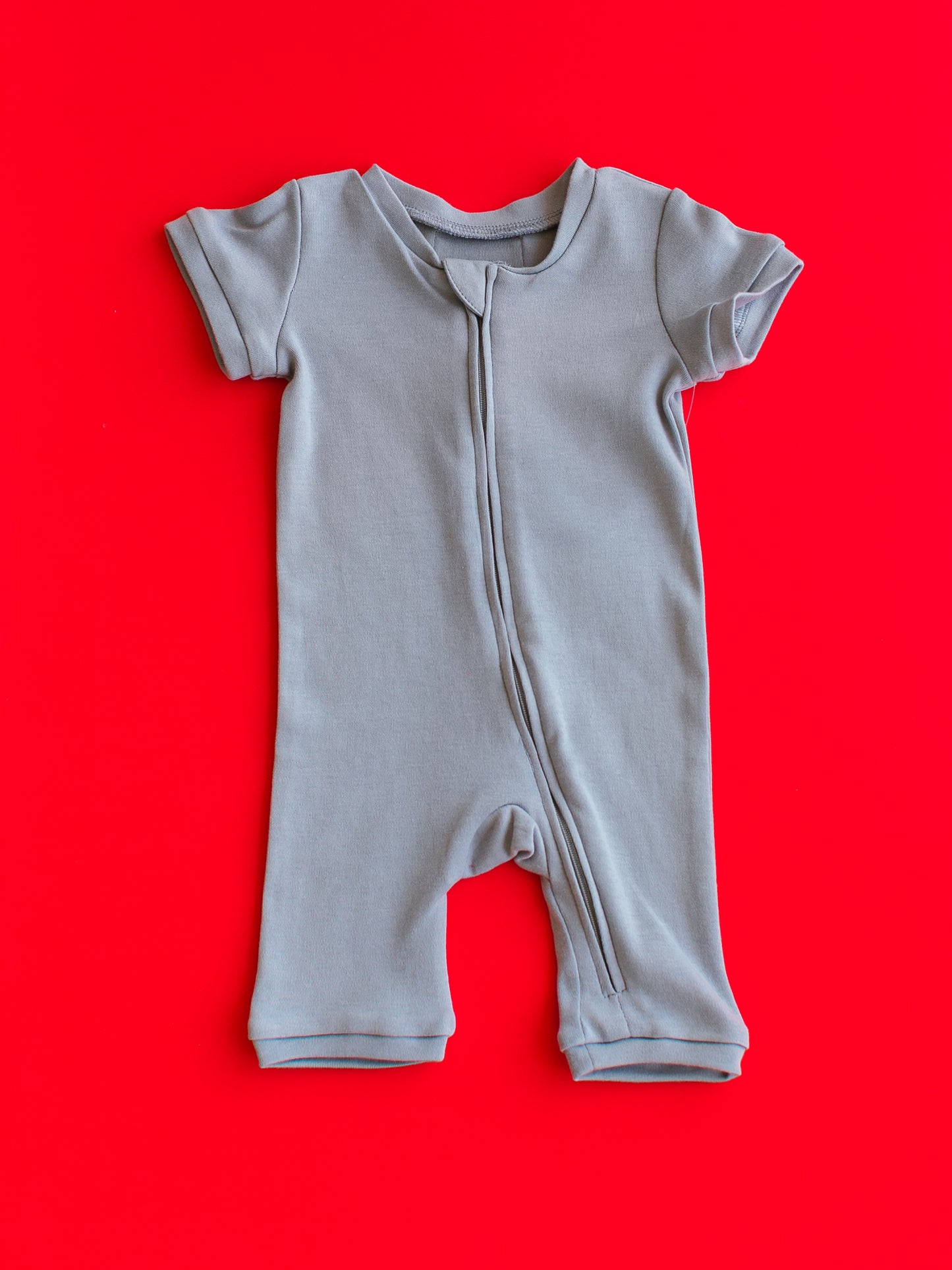 Organic short sleeve zip romper in solid colors – alternate view 5