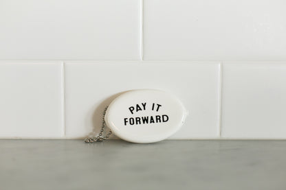 White vintage coin pouch for intentional giving by Modern Burlap