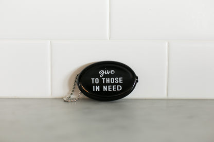 Black vintage coin pouch for intentional giving by Modern Burlap