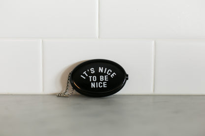 Black vintage coin pouch for intentional giving by Modern Burlap