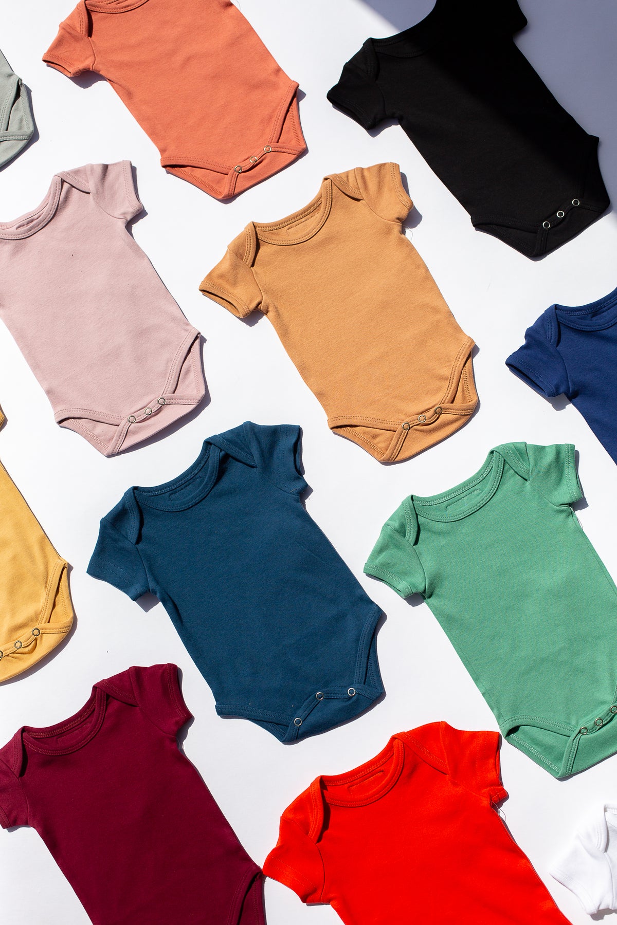 Black Organic Baby Short Sleeve Bodysuit — product photograph.