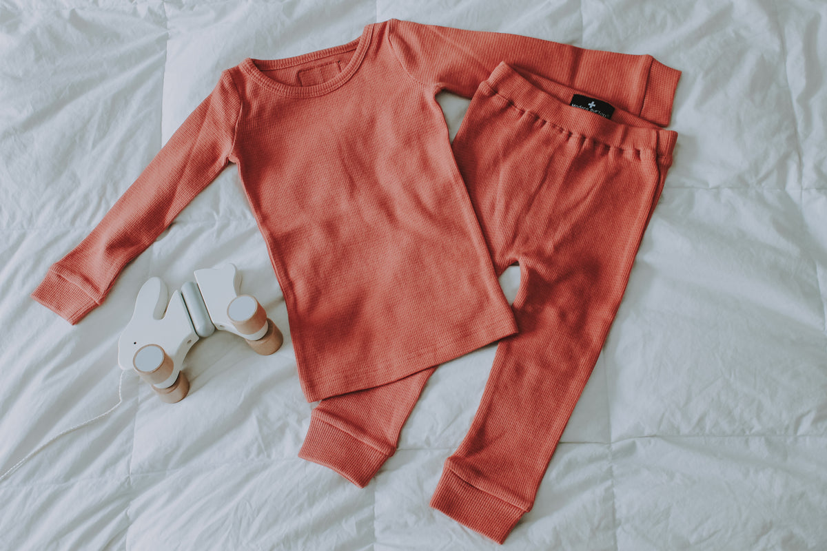Organic Thermal Baby + Kids Pajama Set | Aragon — Thermal top and pants laid flat