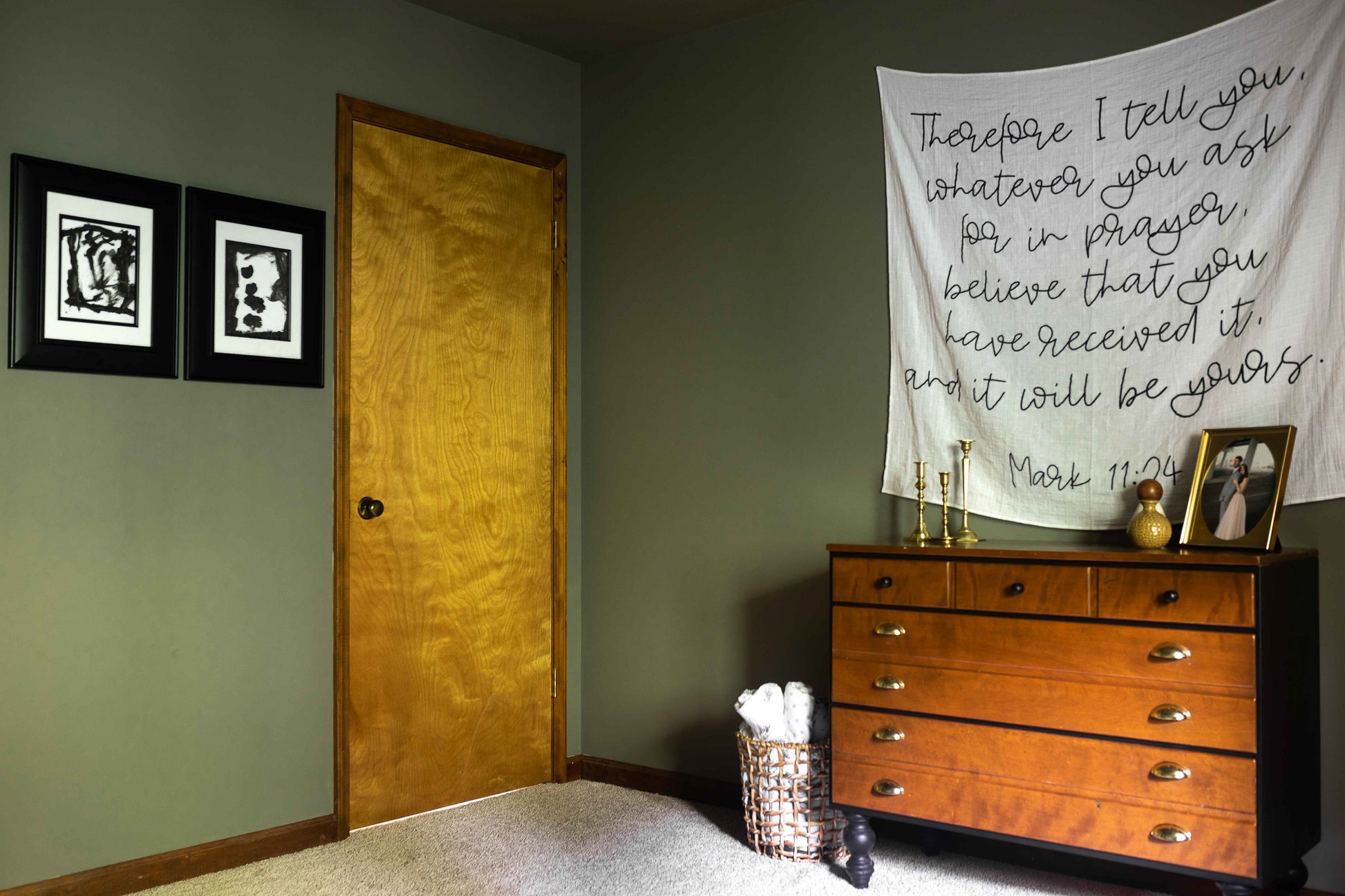 Mark 11:24 Scripture swaddle displayed as nursery wall art