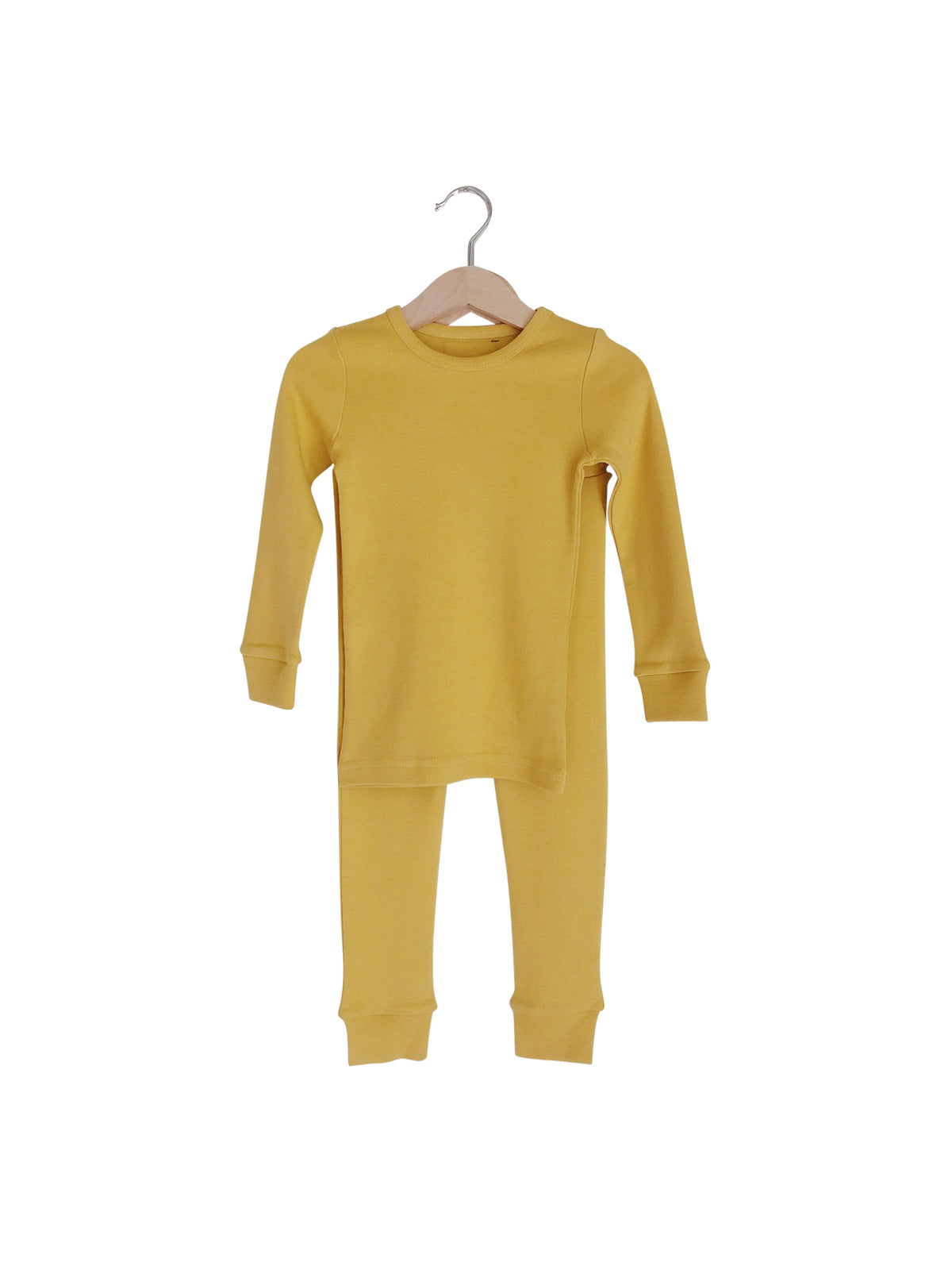 Organic Baby + Kids Pajama Set | Solid Colors — Mustard pajama top and matching pants on hangers