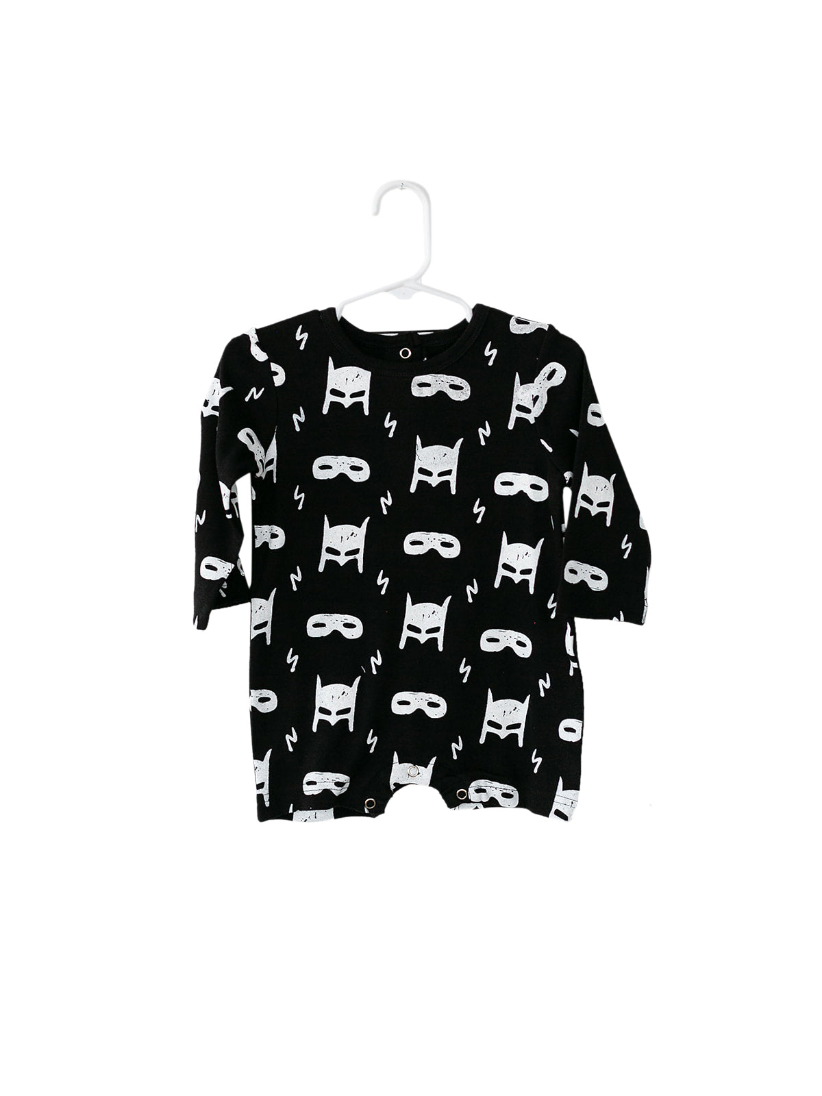 White on Black Hero Struck Organic Baby Long Sleeve Romper — product photograph.