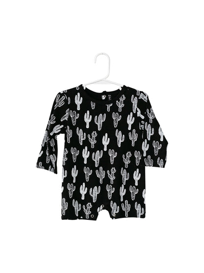 White on Black Cactus Organic Baby Long Sleeve Romper — product photograph.