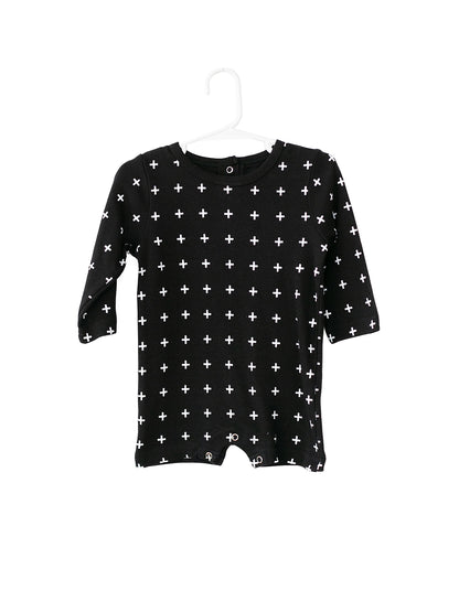White on Black Swiss Cross Organic Baby Long Sleeve Romper — product photograph.