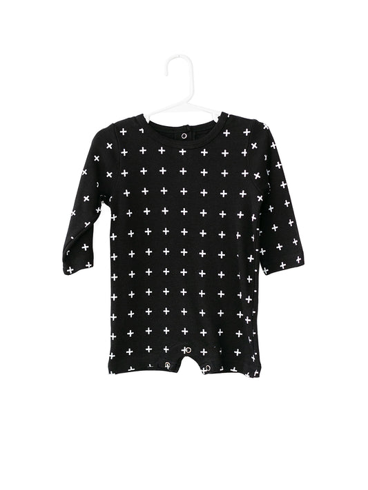 White on Black Swiss Cross Organic Baby Long Sleeve Romper — product photograph.