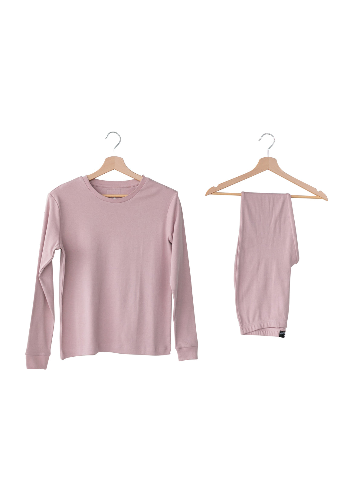 Organic Baby + Kids Pajama Set | Mauve — Pajama top and matching pants on hangers