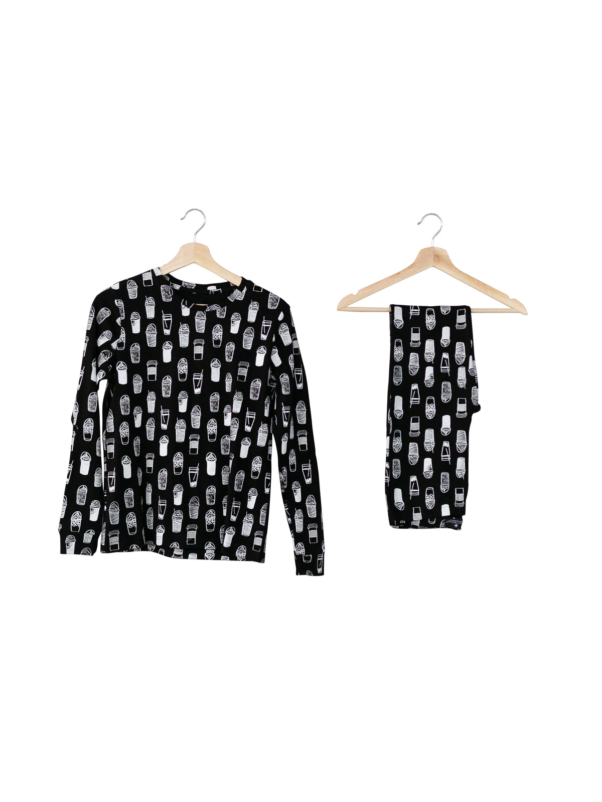 Organic Baby + Kids Pajama Set | White on Black Coffee Love — Printed pajama top and matching pants on hangers