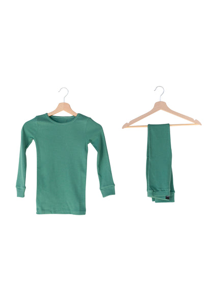 Organic Thermal Baby + Kids Pajama Set | Pine Green — Pajama top and matching pants on hangers