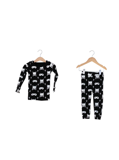 Organic Baby + Kids Pajama Set | White on Black Hero Struck — Printed pajama top and matching pants on hangers