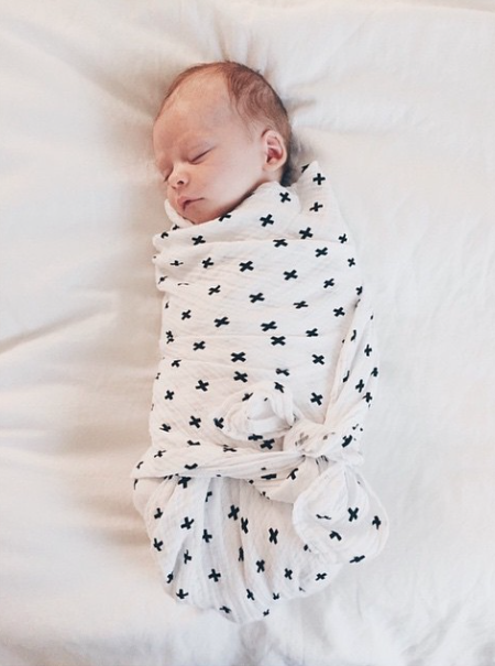 Swiss Cross organic cotton muslin swaddle by Modern Burlap