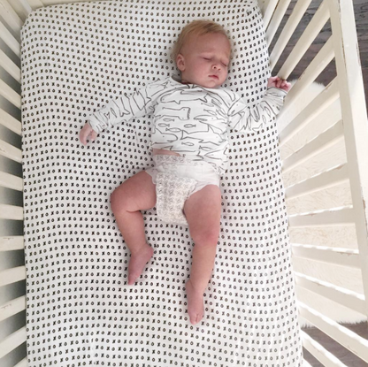 Modern Burlap XO fitted crib sheet in GOTS organic cotton muslin
