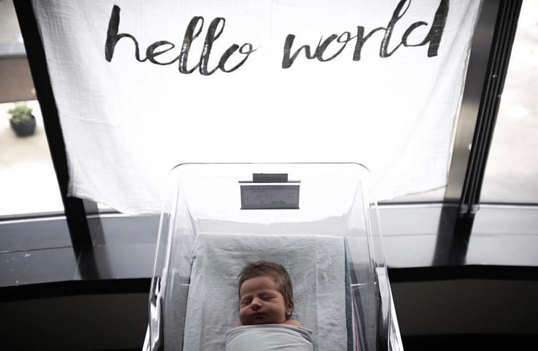 Hello World organic cotton muslin swaddle by Modern Burlap