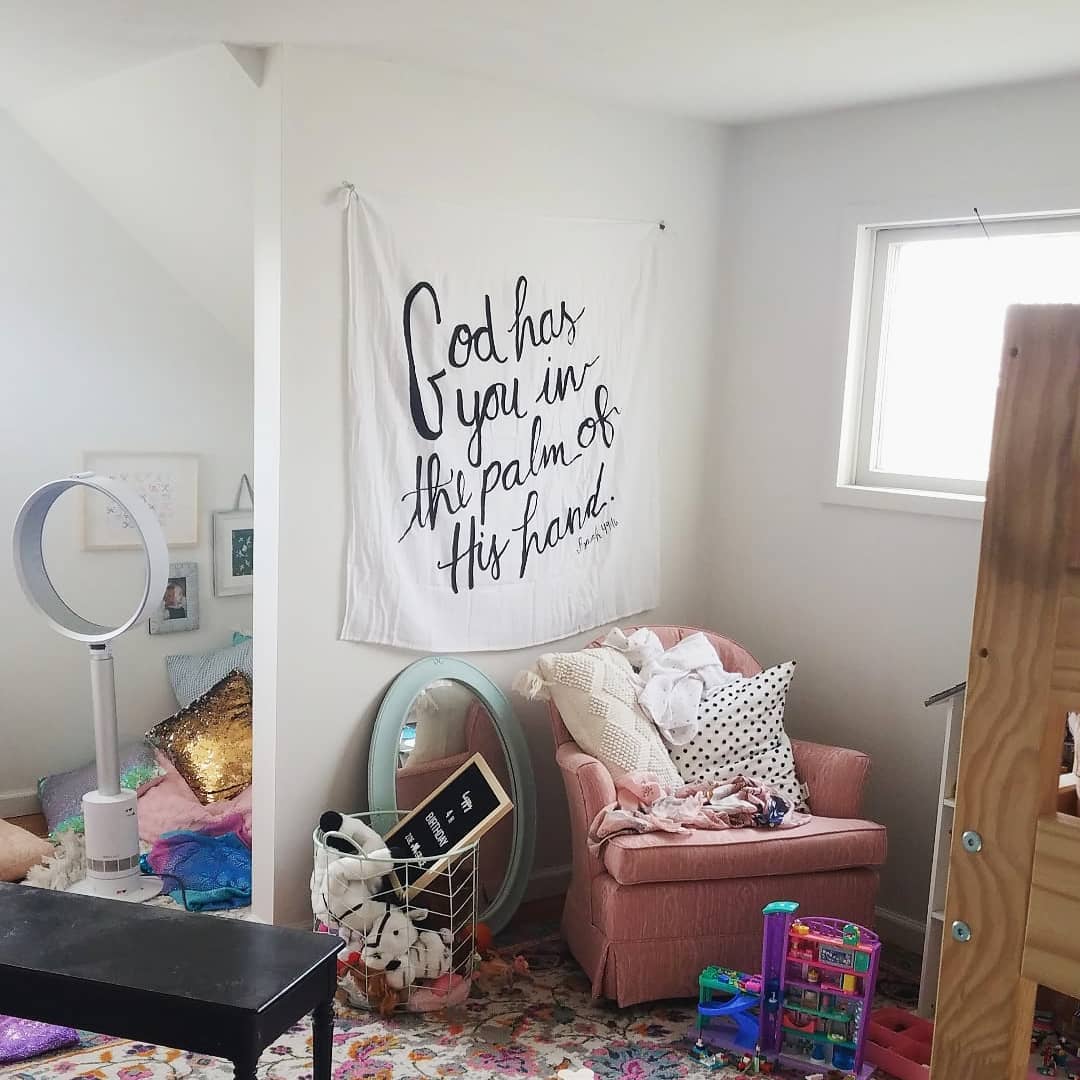 Isaiah 49:16 Scripture swaddle displayed as nursery wall art