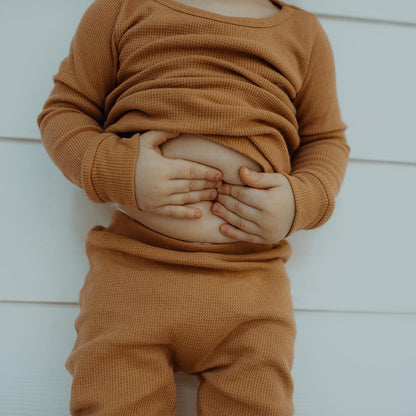 Organic Thermal Baby + Kids Pajama Set | Ginger — Close-up of the thermal top, waist and cuffs