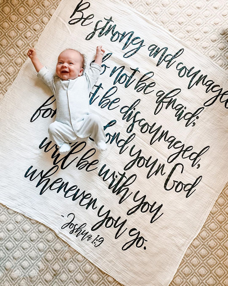 
                  
                    Load image into Gallery viewer, Organic Swaddle + Wall Art -Joshua 1:9 Be strong and courageous. Do not be afraid; do not be discouraged, for the Lord your God will be with you wherever you go.
                  
                