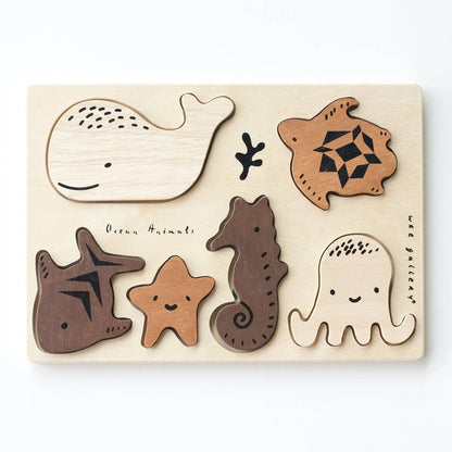 Wee Gallery Ocean Animals wooden tray puzzle with six animal pieces.
