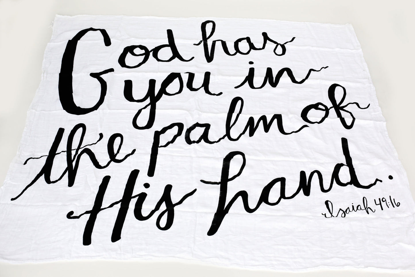 Isaiah 49:16 Scripture swaddle styled for a nursery