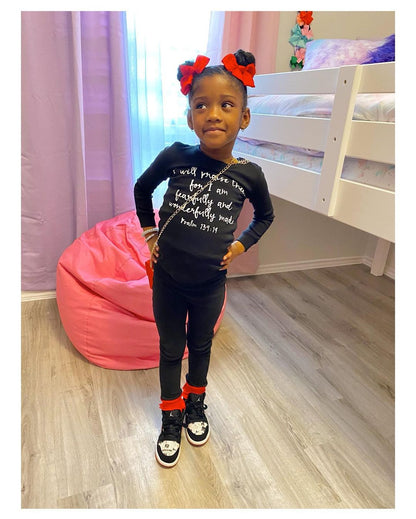 Organic Baby + Kids Pajama Set | Psalm 139:14 — Child wearing pajamas beside a mirror