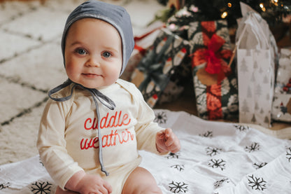 Snowflakes organic cotton muslin swaddle by Modern Burlap