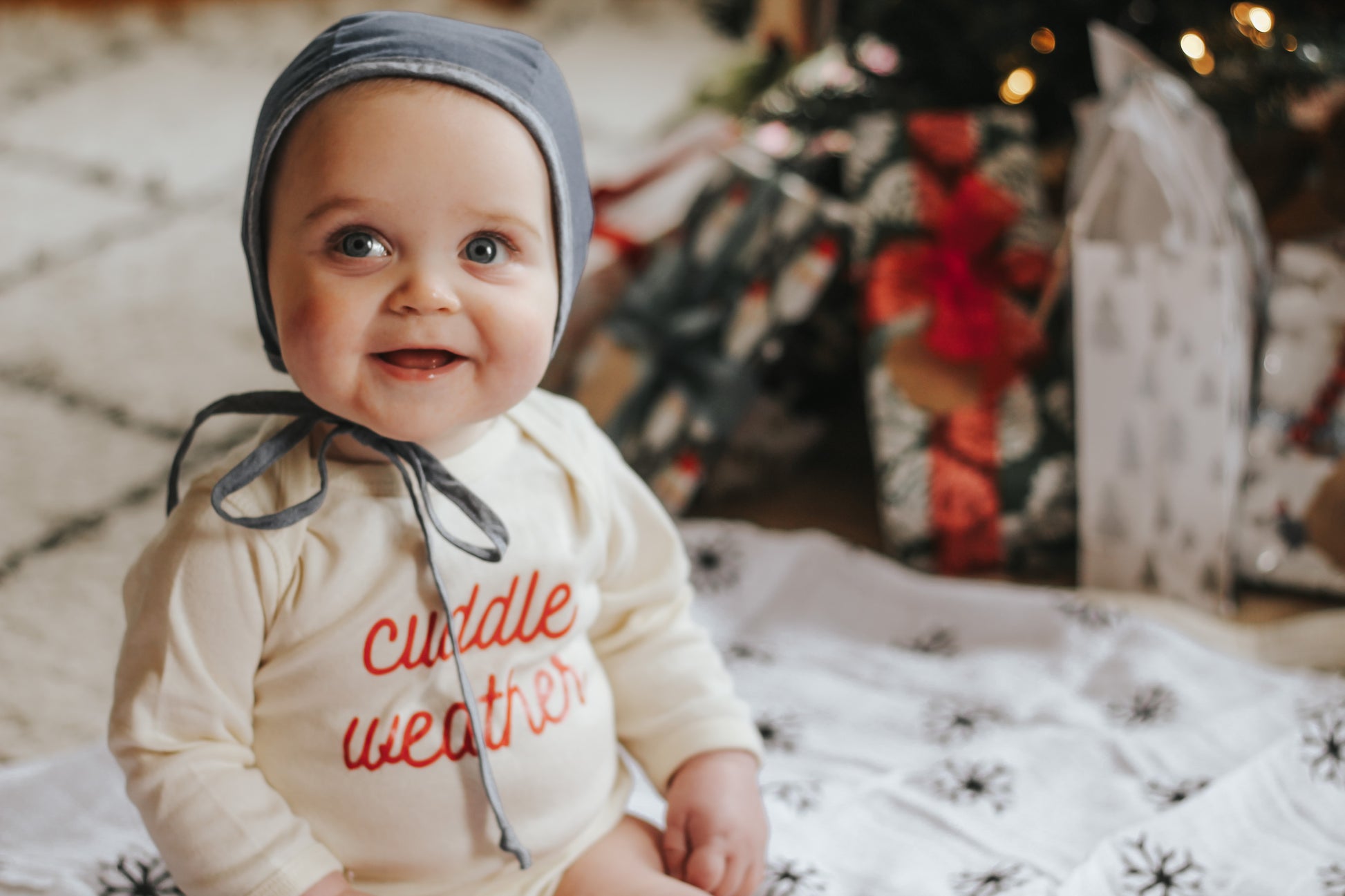 Snowflakes organic cotton muslin swaddle by Modern Burlap