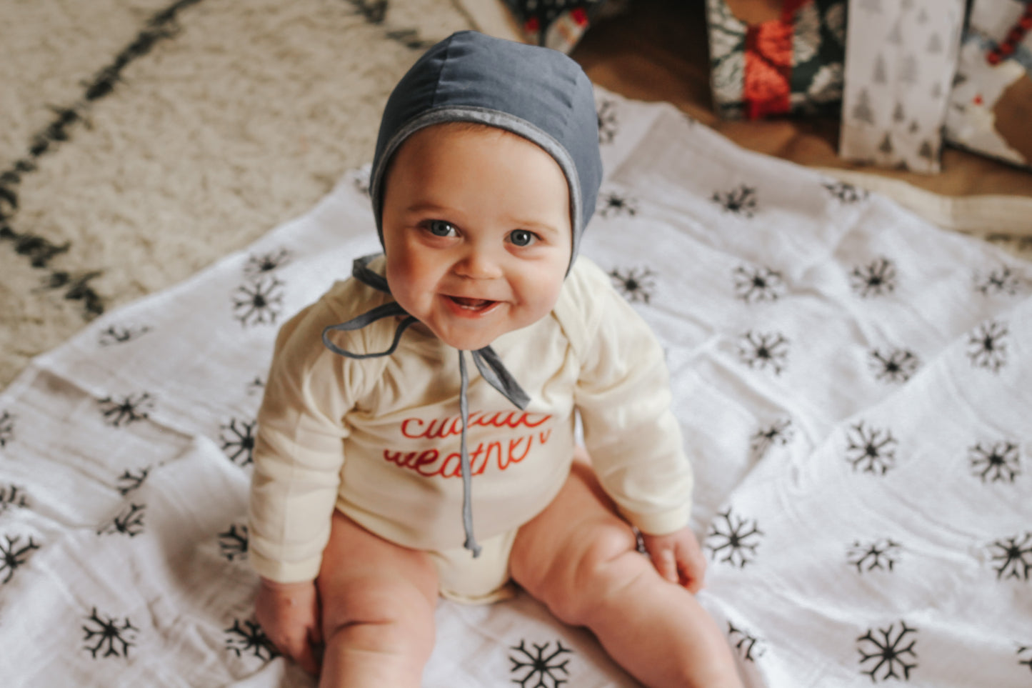 Snowflakes organic cotton muslin swaddle by Modern Burlap