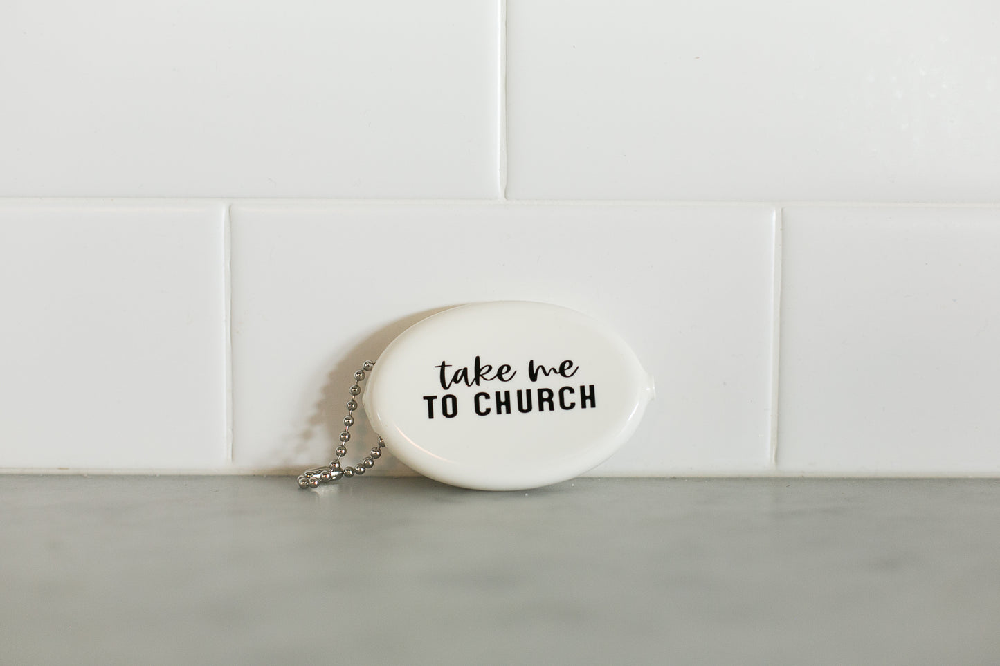 White vintage coin pouch for intentional giving by Modern Burlap