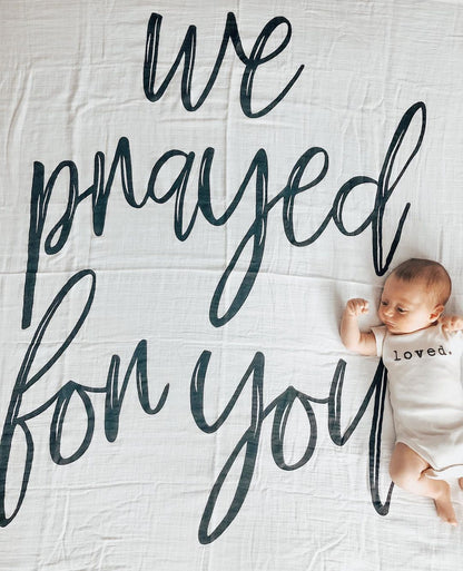 We Prayed for You organic swaddle and wall art by Modern Burlap