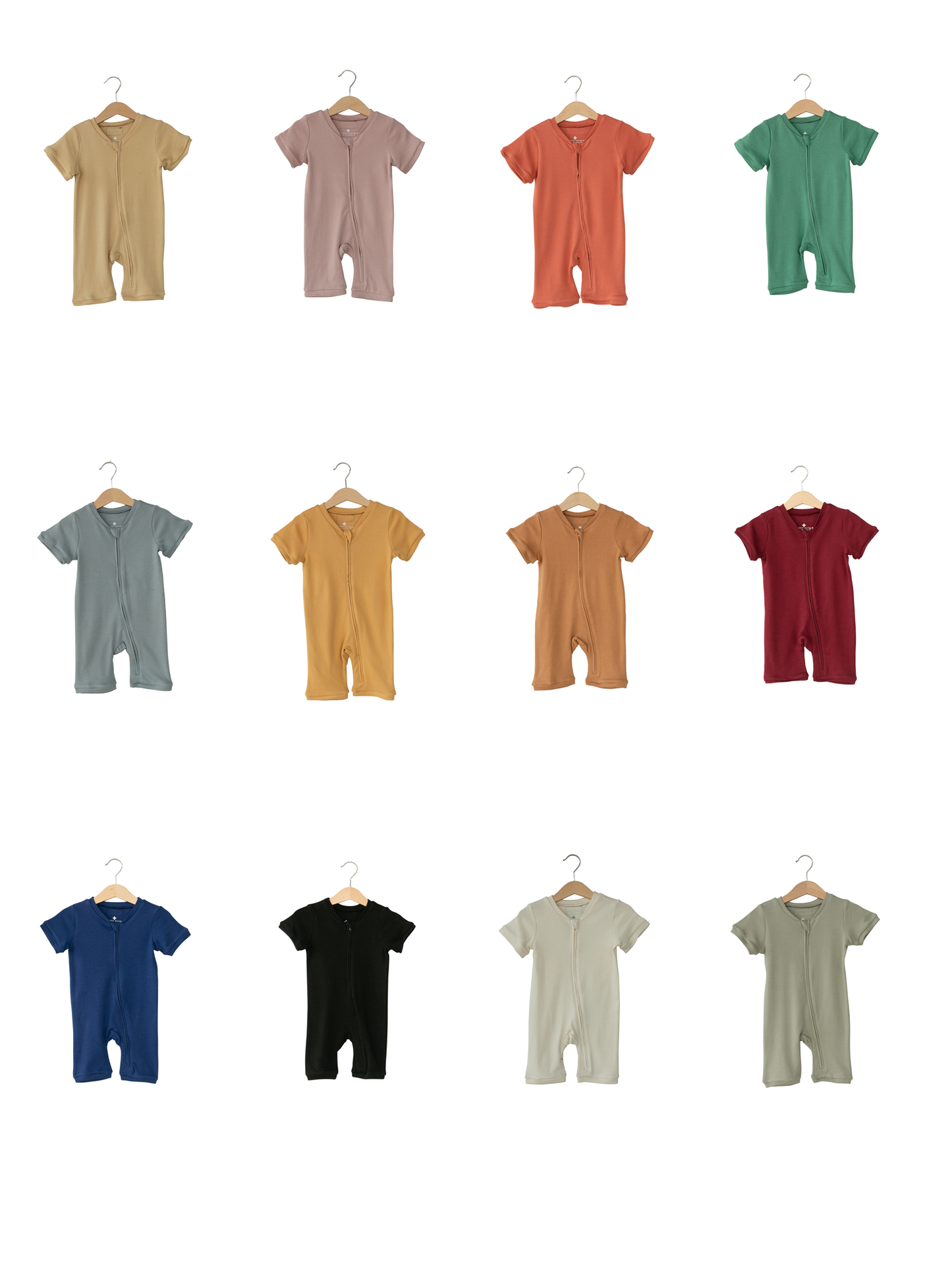 Solid color organic short sleeve zip romper by Modern Burlap