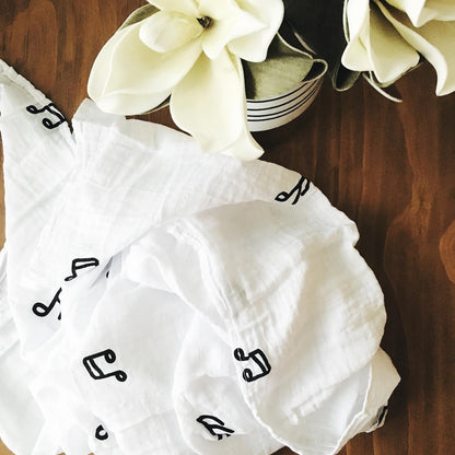 Music Notes Organic Swaddle | GOTS Certified Organic Cotton Muslin